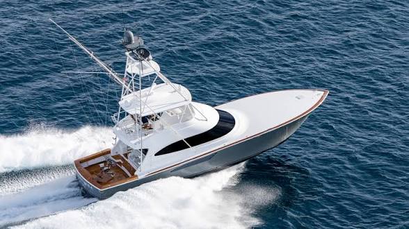 Sport fishing boat cruising on open water